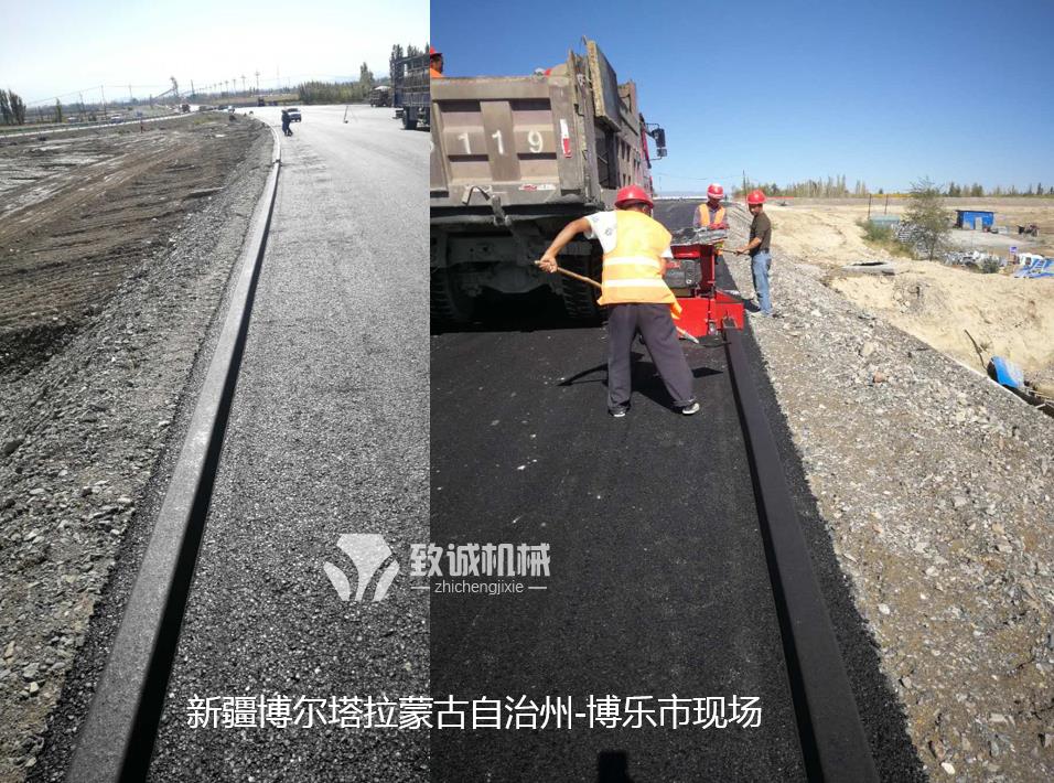 博樂(lè)小型瀝青砂攔水帶滑模機(jī)施工現(xiàn)場(chǎng)